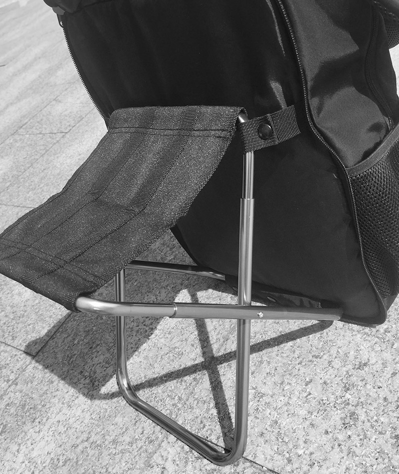 a black bag on a chair